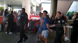 LAX airport police on a man with a Felony warrant out of Texas