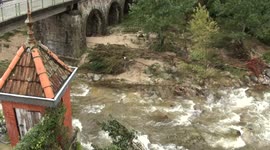 Flash floods swell river after storms in southern France