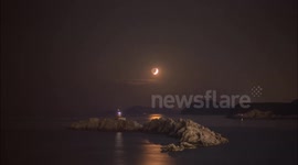 Moon sets over Dubrovnik coastline
