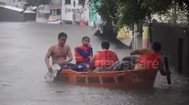 Philippines residents rescued from floods caused by Tropical Storm Mario