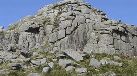 climbing causing destruction to 1000 year old rock formation on dartmoor national park