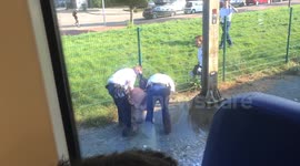 Naked man on the train tracks