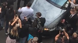 David Beckham departs from Victoria Beckham's shop launch in London