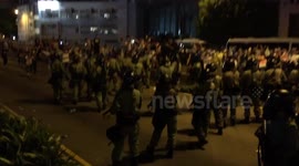 Riot police clash with protestors in Hong Kong