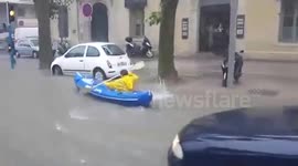 Canoeing down flooded streets in Montpellier, France