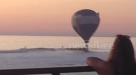 Drama as hot air balloon lands in the ocean off San Diego