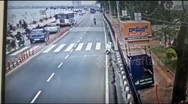 Newsflare Edit - High-speed biker carries pedestrian along road after crash
