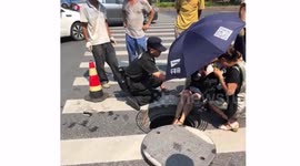 Double misfortune! Woman falls into well after being knocked from scooter