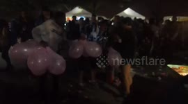 Nitrous Oxide: Selling balloons in the lot at Shoreline Amphitheatre in Mountain View, California