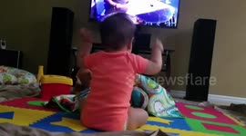 Move over Dave Grohl! This baby is amazing at (air) drumming!