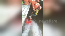 Firemen rescue boy trapped in irrigation canal in China's Shaanxi