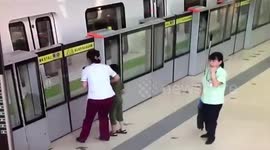 Woman dives into train, leaving son on platform