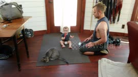 Crawling Baby Wants to Play with Cat