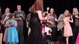 Teenager with Down Syndrome hopes seven months of singing practice will see her crowned Miss Amazing America