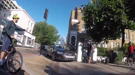 Shocking moment motorist in 'stolen' car drives aggressively at London cyclists