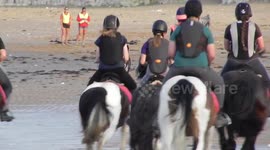 Pony riding on the Beach in Joss Bay Kent by jim connor