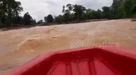 Rescuers search for survivors and deliver food after Laos dam tragedy