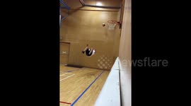 Parkour expert nails amazing basketball backflip
