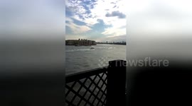 Police pursue speeding Jet Ski riders on the Thames