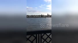 Newsflare Edit - Boat police chase on the river Thames after four jet skiers