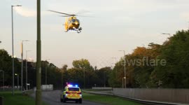 East Anglia Air Abulance roadside taking off after Hit and Run