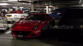 South bank london, underground car park exclusive vid of over a hundres race cars being fitted out with gumball rally paint jobs by jim connor