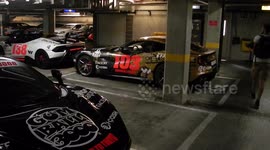 South bank london, underground car park exclusive vid of over a hundres race cars being fitted out with gumball rally paint jobs by jim connor