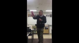 Teacher spins speaker to demonstrate Doppler effect