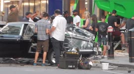 Men In Black Car Being Fixed