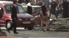Extras On Set Of men In Black