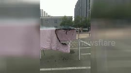 Quilt left out to dry smoulders amid China heatwave