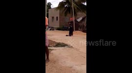 Woman is rescued after being chained to wooden log for two years