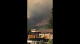 Dark smoke from Ranch Fire fills the sky near Clearlake Oaks, California