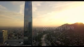 Costanera Center sunset while crashing Titanium Tower Colorized