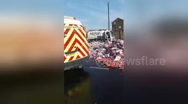 Major UK road closed after lorry crash sends thousands of Coke cans onto road