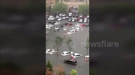 Hundreds of vehicles submerged in northern China floods