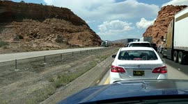 Overturned Semi New Mexico block, cab being towed away, I-40