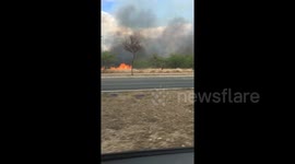 Major road in Oahu, Hawaii, closed off as brush fire burns dangerously close