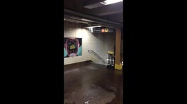 Severe thunderstorms in New York cause flooding of subway station.