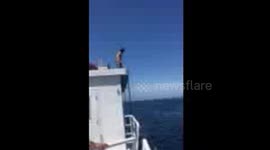 3 story boat jump ends in belly flop 2nd angle