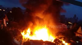 Fire destroys 16 antique wooden homes in Bangkok