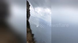 Waterspout forms off coast of France amid heavy thunderstorms