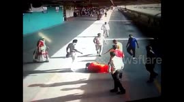 Hero cop saves woman from getting crushed under train