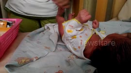 how to dress a baby