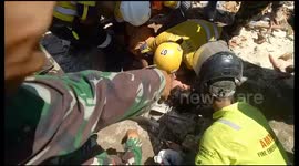 Dramatic moment high-school student pulled from rubble three days after Indonesia quake