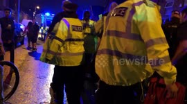 Moss Side shooting victim being moved amid chaotic scenes
