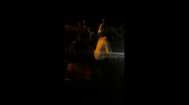 Indian people coming off from a transporter to get free food on a marriage