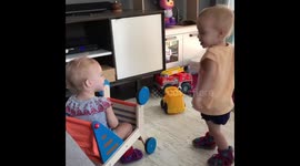 Twins have a discussion in their own language