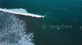 Drone footage of Paddle board surfing in Maui