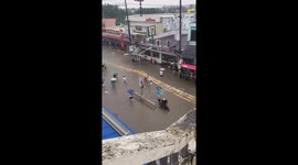 Flooded road in the Philippines after days of heavy rain